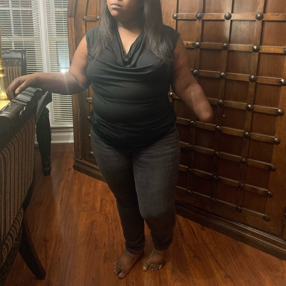 Black sleeveless Tank top.